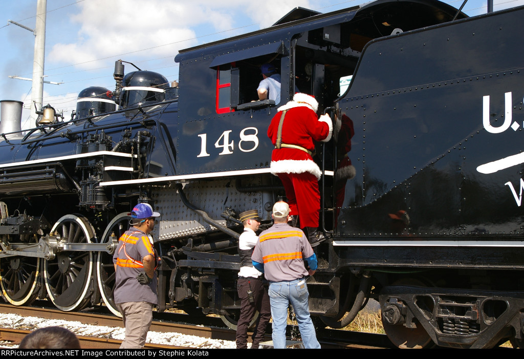 SCFE 148 SANTA CLIMBING DOWN FROM CAB